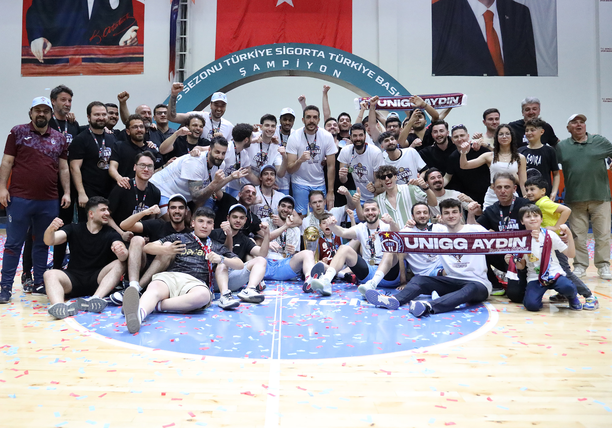 Our Champion Basketball Team Lifts the Trophy